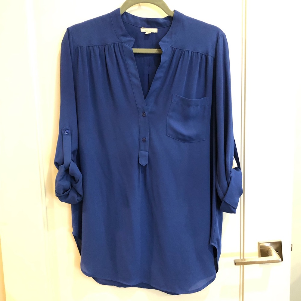 Blue relaxed fit blouse with button-cuff sleeves